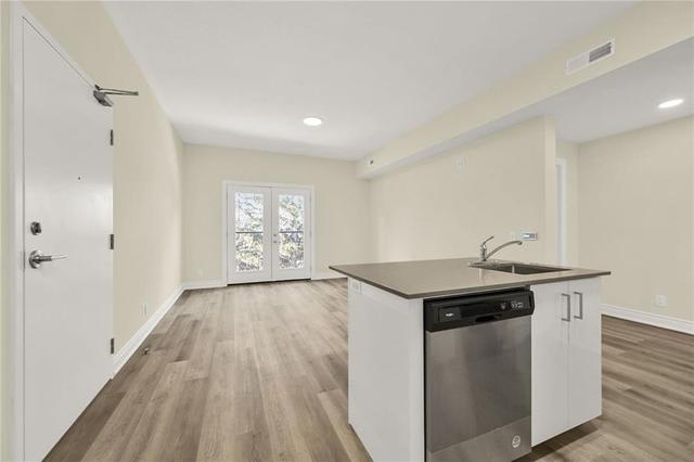 303c - 261 King Street E, Condo with 2 bedrooms, 1 bathrooms and 1 parking in Hamilton ON | Image 13