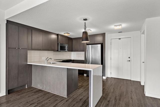 318 - 25 Aspenmont Heights Sw, Condo with 3 bedrooms, 2 bathrooms and 2 parking in Calgary AB | Image 9