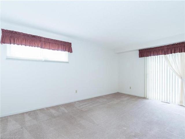Picture of living room free of furniture (prior to new paint) | Image 2