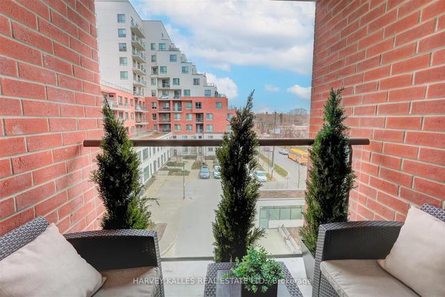 522 - 22 East Haven Dr, Condo with 2 bedrooms, 2 bathrooms and 1 parking in Toronto ON | Image 2