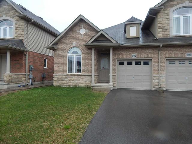 302 Keystone Cres, House attached with 2 bedrooms, 2 bathrooms and 1 parking in Hamilton ON | Image 1