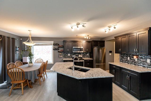 4825 Aspen Lakes Boulevard, House detached with 3 bedrooms, 2 bathrooms and 4 parking in Red Deer County AB | Image 1