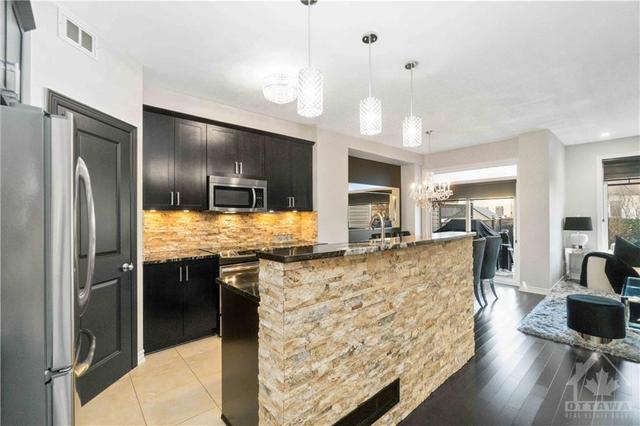 345 Widgeon Way, Townhouse with 3 bedrooms, 3 bathrooms and 3 parking in Ottawa ON | Image 3