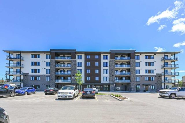 110 - 108 Summit Ridge Dr, Condo with 1 bedrooms, 1 bathrooms and 1 parking in Guelph ON | Image 1