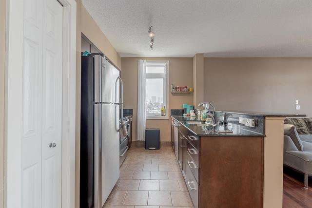 401 - 2419 Centre Street Nw, Condo with 2 bedrooms, 2 bathrooms and 1 parking in Calgary AB | Image 6