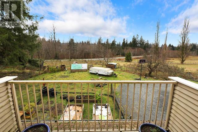 7522 Island Hwy N, House detached with 4 bedrooms, 3 bathrooms and 10 parking in Comox Valley C (Puntledge   Black Creek) BC | Image 36