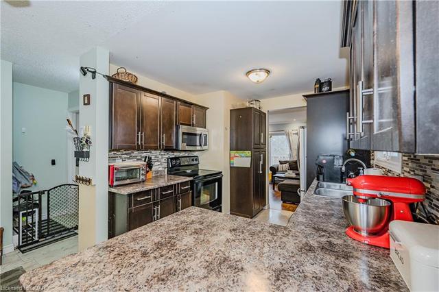 38 - 80 Ferman Dr, House attached with 3 bedrooms, 1 bathrooms and 1 parking in Guelph ON | Image 3