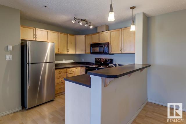 307 - 646 Mcallister Lo Sw, Condo with 2 bedrooms, 2 bathrooms and 2 parking in Edmonton AB | Image 14