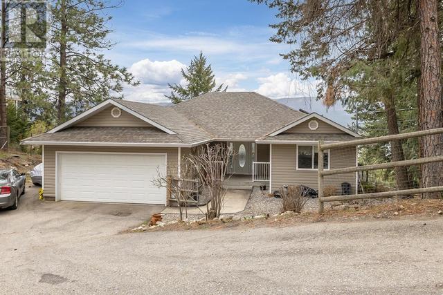 10291 Columbia Way, House detached with 3 bedrooms, 3 bathrooms and 7 parking in Central Okanagan West BC | Image 1