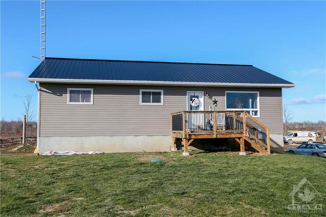 22 Atkins Lake Road, House detached with 3 bedrooms, 2 bathrooms and 20 parking in Elizabethtown Kitley ON | Image 1
