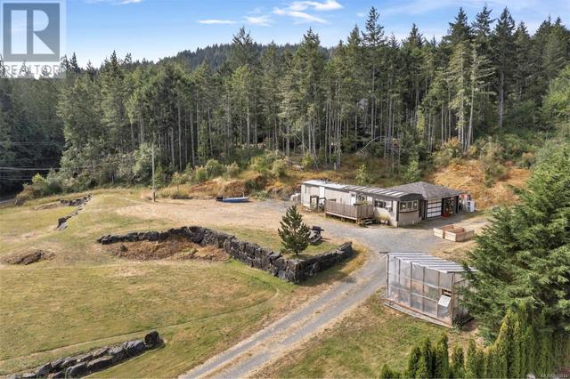 6321 East Sooke Rd, House detached with 2 bedrooms, 1 bathrooms and 5 parking in Juan de Fuca BC | Card Image