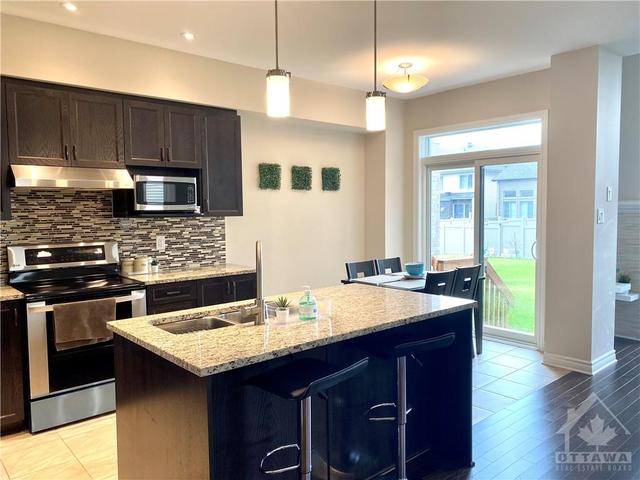 593 Rowers Way, Townhouse with 3 bedrooms, 3 bathrooms and 2 parking in Ottawa ON | Image 9