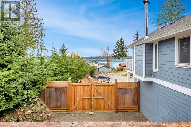 5915 Garvin Rd, House detached with 6 bedrooms, 4 bathrooms and 8 parking in Comox Valley A BC | Image 37