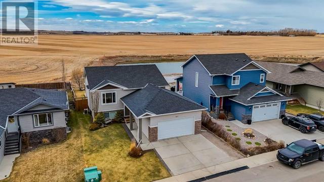 667 West Highland Crescent, House detached with 4 bedrooms, 3 bathrooms and 4 parking in Carstairs AB | Image 42