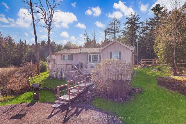 406 Kennedy Dr, House detached with 2 bedrooms, 1 bathrooms and 8 parking in Trent Lakes ON | Image 11