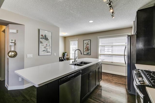 35 Aspen Hills Green Sw, Home with 2 bedrooms, 2 bathrooms and 2 parking in Calgary AB | Image 11