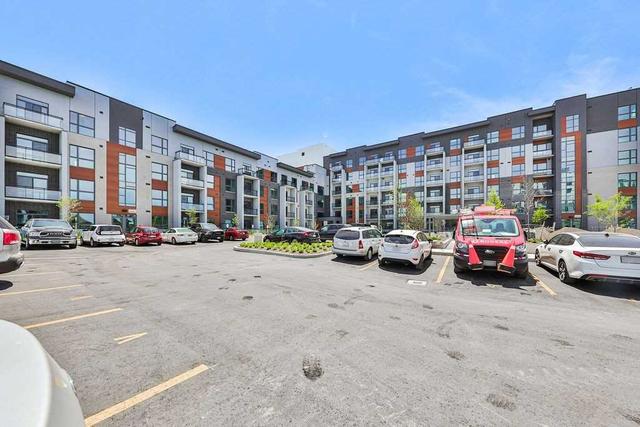 003 - 95 Dundas St W, Condo with 1 bedrooms, 1 bathrooms and 1 parking in Oakville ON | Image 1