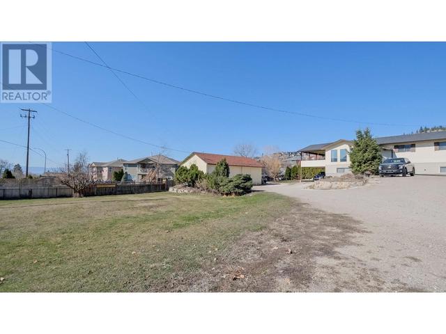 1584 Highway 33 E, House detached with 4 bedrooms, 2 bathrooms and 20 parking in Kelowna BC | Image 46