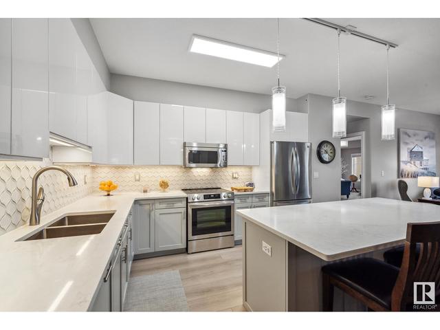 420 - 1406 Hodgson Wy Nw, Condo with 2 bedrooms, 2 bathrooms and 2 parking in Edmonton AB | Image 13