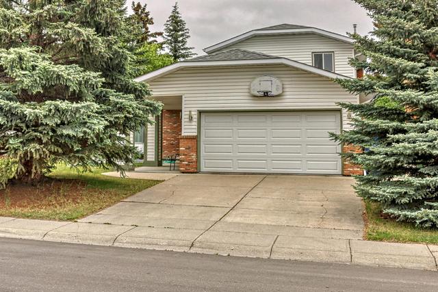 20 Woodmont Drive Sw, House detached with 5 bedrooms, 3 bathrooms and 4 parking in Calgary AB | Image 1
