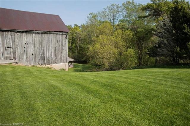 view of neighbours barn from backyard | Image 40