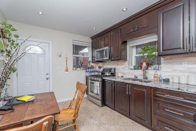 1050 Ossington Ave, House attached with 4 bedrooms, 2 bathrooms and 2 parking in Toronto ON | Image 2