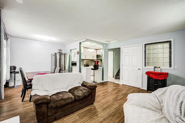 224 Pinemill Mews Ne, Home with 4 bedrooms, 2 bathrooms and 3 parking in Calgary AB | Image 7