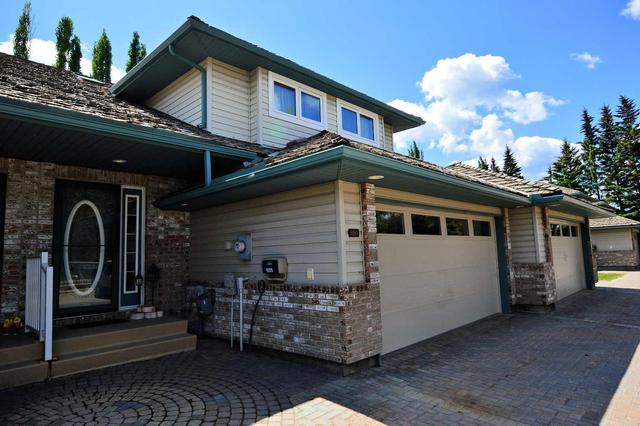 9205 Wedgewood Drive, Home with 3 bedrooms, 3 bathrooms and 3 parking in Grande Prairie County No. 1 AB | Image 1