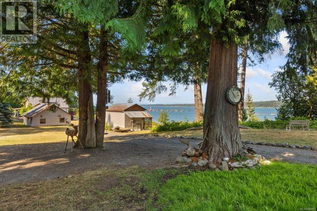 6249 Island Hwy, House detached with 3 bedrooms, 3 bathrooms and 8 parking in Comox Valley A BC | Image 94
