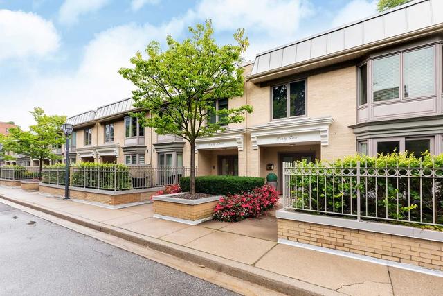42 Lower Village Gate, Townhouse with 3 bedrooms, 4 bathrooms and 2 parking in Toronto ON | Image 1