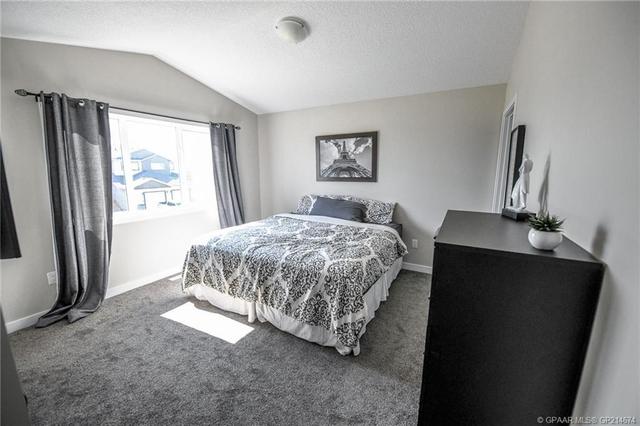 8410 101 Avenue, Home with 3 bedrooms, 2 bathrooms and 2 parking in Greenview No. 16 AB | Image 27