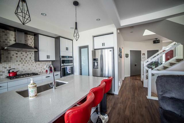 499 Greywolf Cove N, House detached with 4 bedrooms, 3 bathrooms and 4 parking in Lethbridge AB | Image 18
