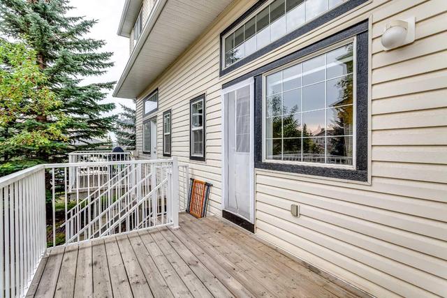 71 Cougar Ridge Mews Sw, Home with 2 bedrooms, 1 bathrooms and 2 parking in Calgary AB | Image 33