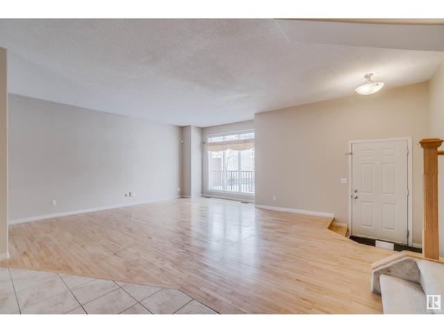 1 - 8403 164 Av Nw, House attached with 3 bedrooms, 2 bathrooms and 4 parking in Edmonton AB | Card Image