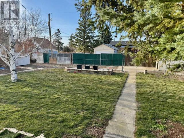 521 52 Avenue, House detached with 2 bedrooms, 1 bathrooms and 4 parking in Coalhurst AB | Image 19