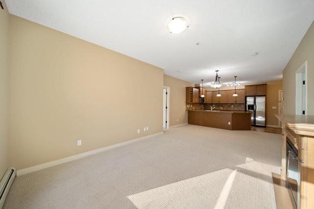211 - 35 Aspenmont Heights Sw, Condo with 2 bedrooms, 2 bathrooms and 1 parking in Calgary AB | Image 13
