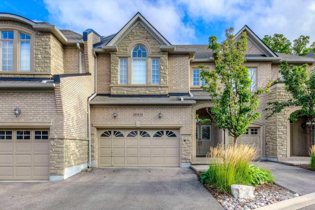 12 - 2254 Rockingham Dr, Townhouse with 3 bedrooms, 4 bathrooms and 2 parking in Oakville ON | Image 1