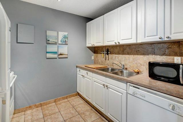 1203 - 4944 Dalton Drive Nw, Condo with 2 bedrooms, 1 bathrooms and 1 parking in Calgary AB | Image 2