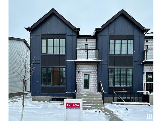 7744 Yorke Me Nw Nw, House attached with 4 bedrooms, 3 bathrooms and 4 parking in Edmonton AB | Image 2
