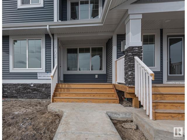 5702 Juchli Av Nw, House attached with 3 bedrooms, 3 bathrooms and null parking in Edmonton AB | Image 2