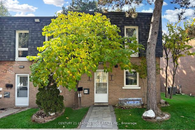 10 - 19 Derrydown Rd, Townhouse with 2 bedrooms, 3 bathrooms and 1 parking in Toronto ON | Image 1