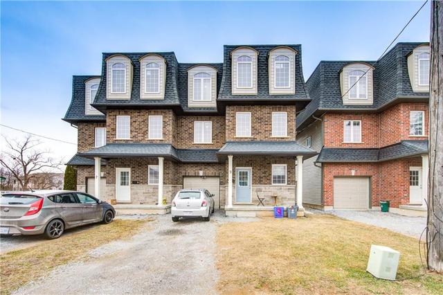 9 Chestnut Street E, House semidetached with 7 bedrooms, 3 bathrooms and 1 parking in St. Catharines ON | Image 1
