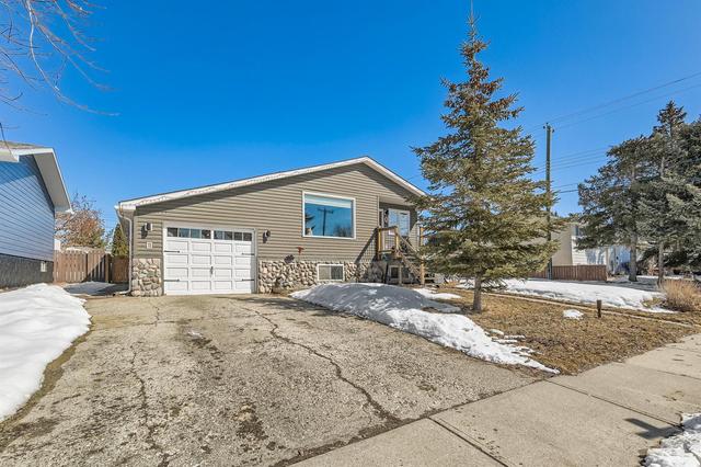 115 Lake Sylvan Close Se, House detached with 3 bedrooms, 2 bathrooms and 6 parking in Calgary AB | Image 2