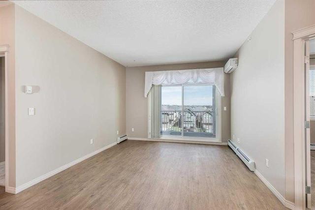 1407 - 522 Cranford Drive Se, Condo with 2 bedrooms, 2 bathrooms and 1 parking in Calgary AB | Image 7