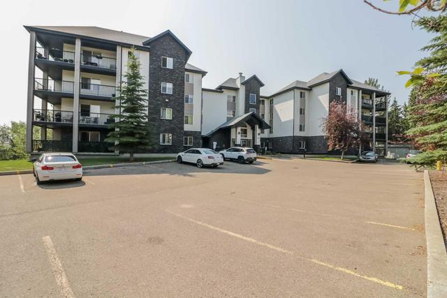310 - 5601 Kerry Wood Drive, Condo with 2 bedrooms, 2 bathrooms and 1 parking in Red Deer AB | Image 1