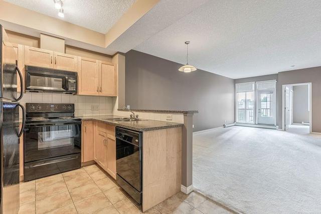 406 - 5720 2 Street Sw, Condo with 2 bedrooms, 2 bathrooms and 2 parking in Calgary AB | Image 2