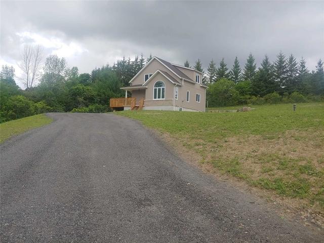 5849 Rice Lake Scenic Dr, House detached with 3 bedrooms, 2 bathrooms and 16 parking in Hamilton TP ON | Image 1