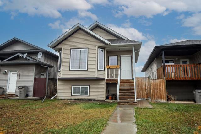 11546 76 Avenue, House detached with 5 bedrooms, 2 bathrooms and 4 parking in Grande Prairie AB | Image 1