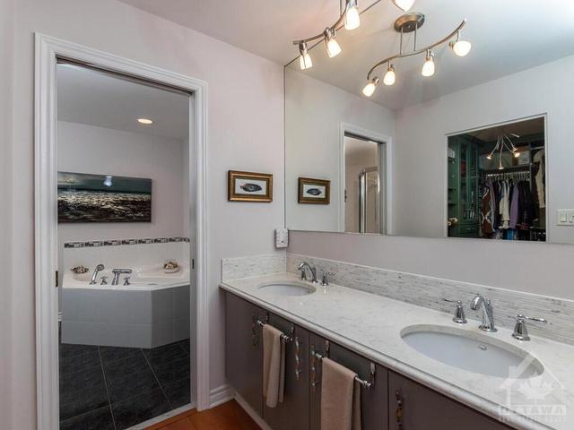 Dressing area with lovely long vanity and 2 sinks! | Image 17