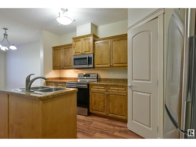 104 - 9820 165 St Nw, Condo with 2 bedrooms, 2 bathrooms and 1 parking in Edmonton AB | Image 2